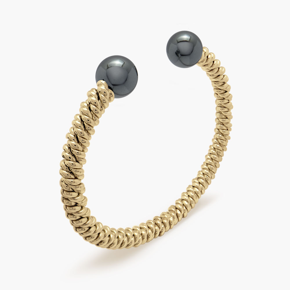 9ct Gold Hematite Torsione Torque Bangle 9ct Gold Hematite Torsione Torque Bangle